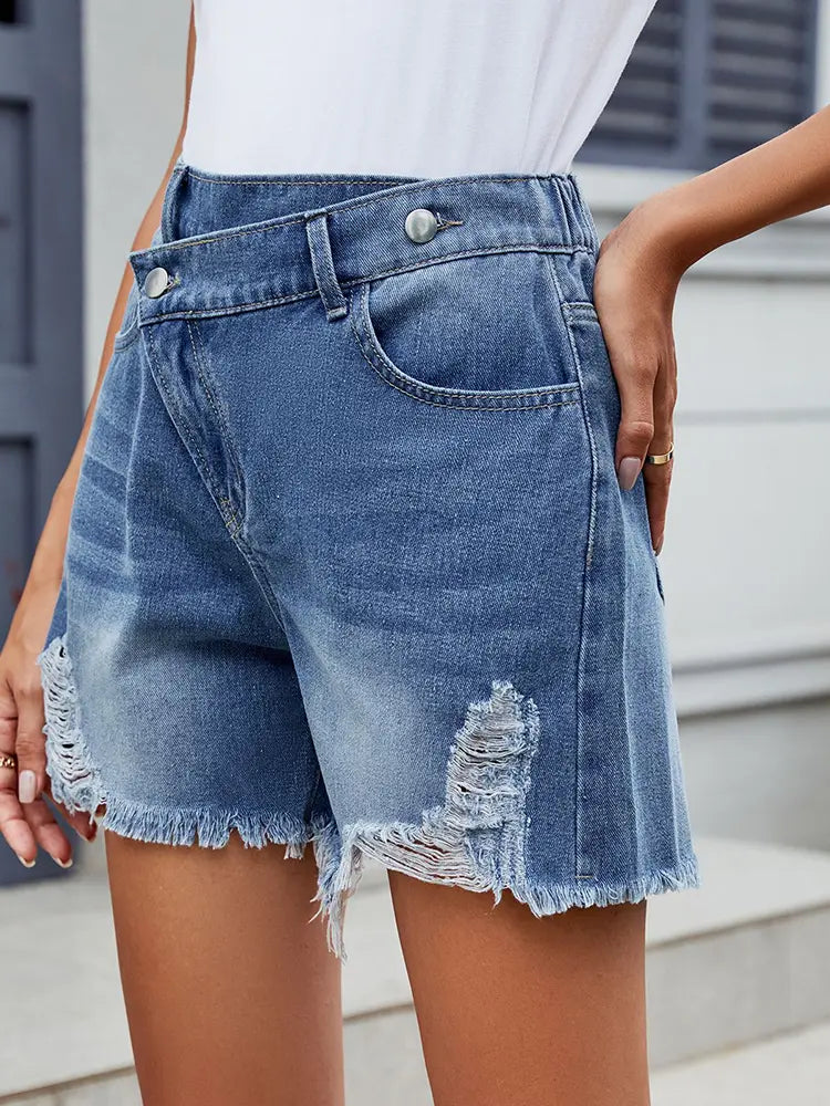 Sommer asymmetrische Fransen-Denim-Shorts