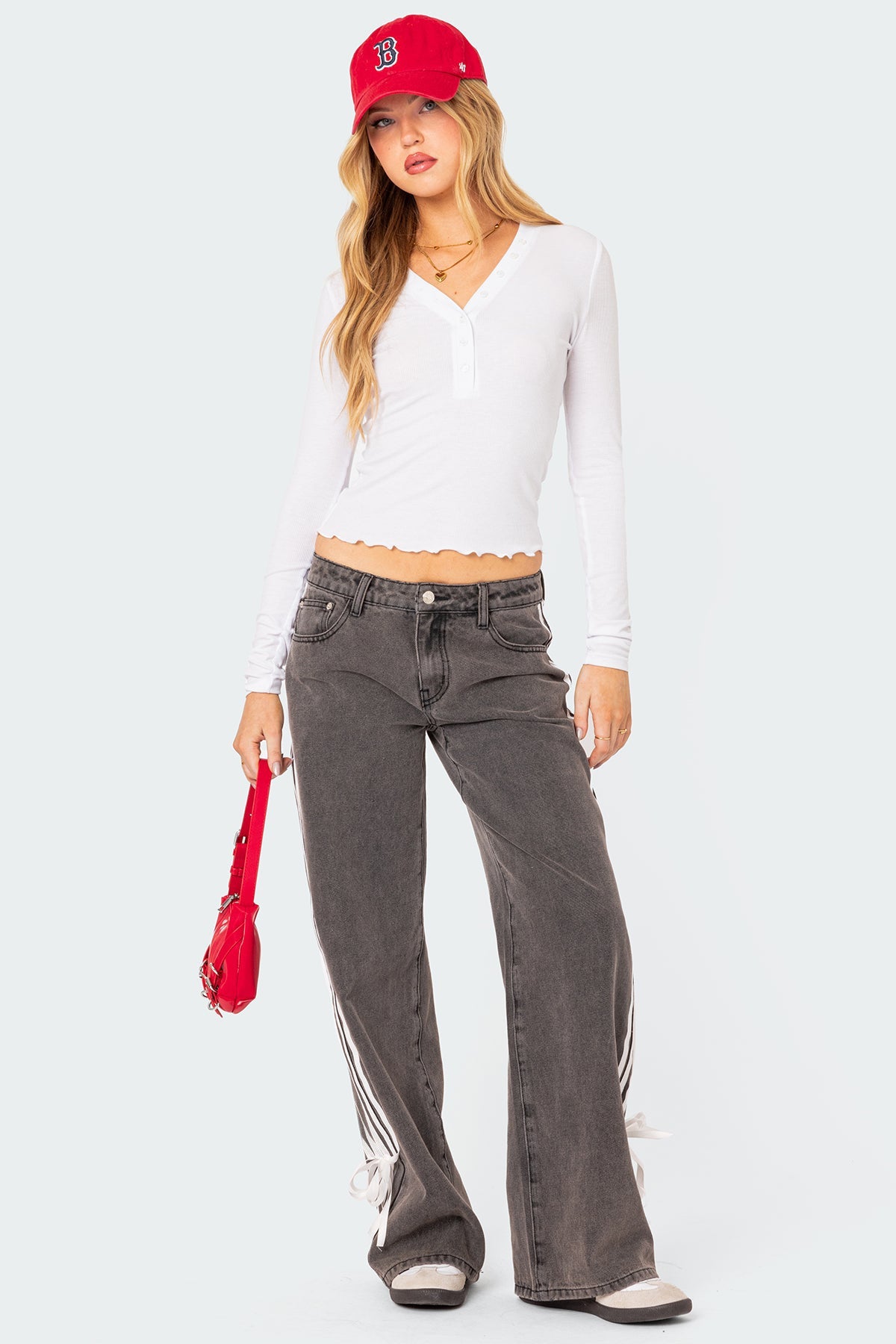 Hose mit niedrigem Bund, lockerem Schnitt, Seitenstreifen und Schleife, weitbeinige Jeans