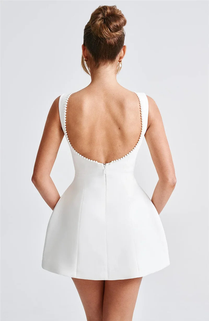 Elegantes Perlen-Rücken-Schleifen-Rückenfreies Sexy ärmelloses Mini-Kleid