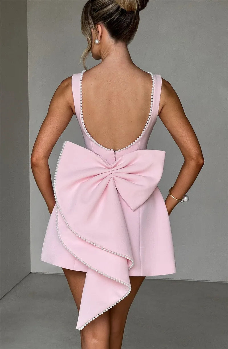 Elegantes Perlen-Rücken-Schleifen-Rückenfreies Sexy ärmelloses Mini-Kleid