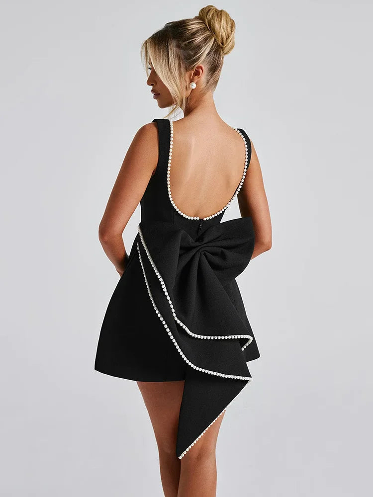 Elegantes Perlen-Rücken-Schleifen-Rückenfreies Sexy ärmelloses Mini-Kleid